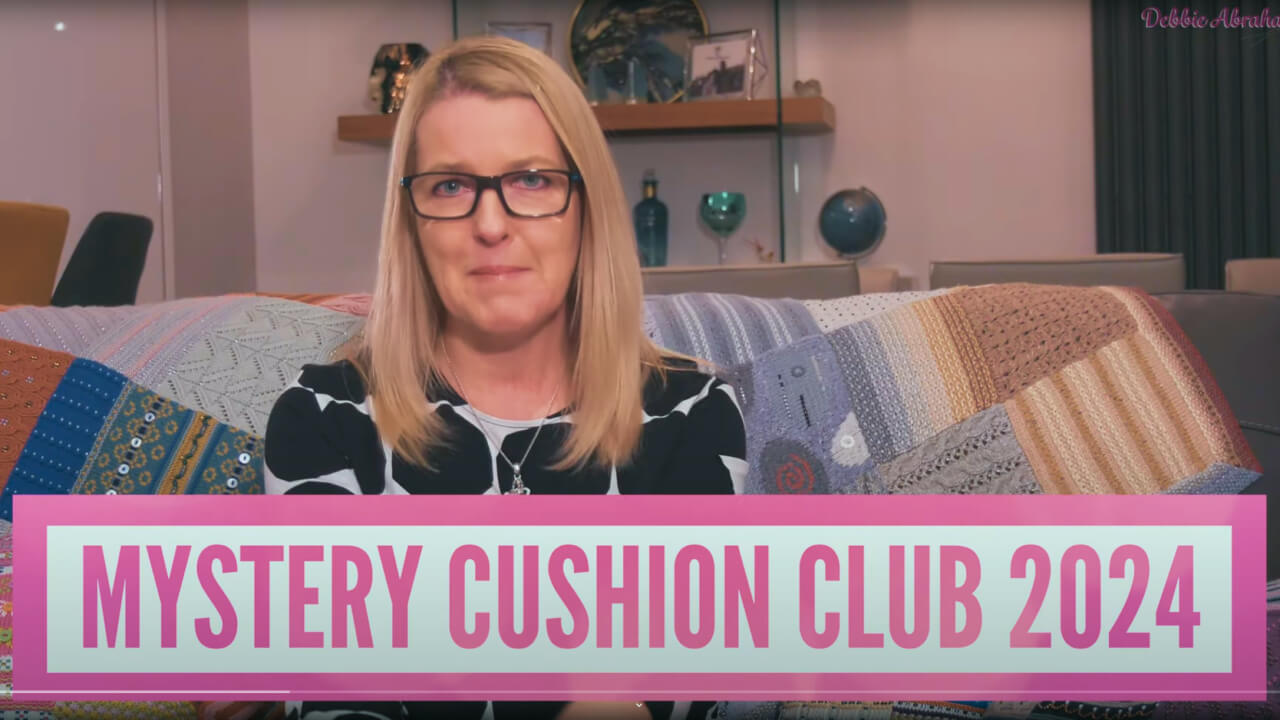 Load video: How does the Mystery Cushion Knit Along Club work?